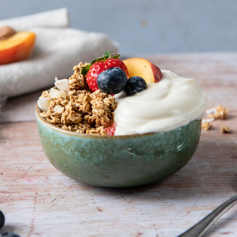 Granola with yogurt and peach